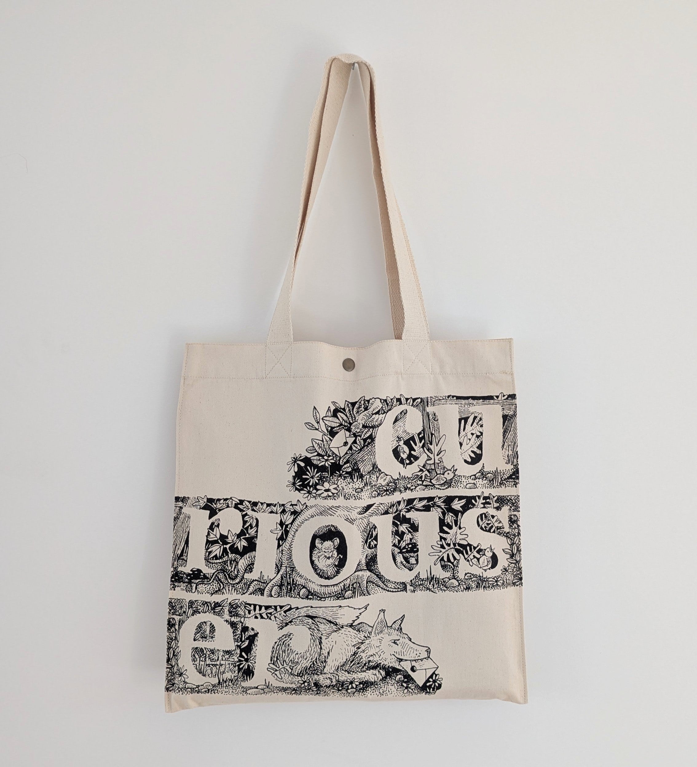 Curiouser Tote Bag
