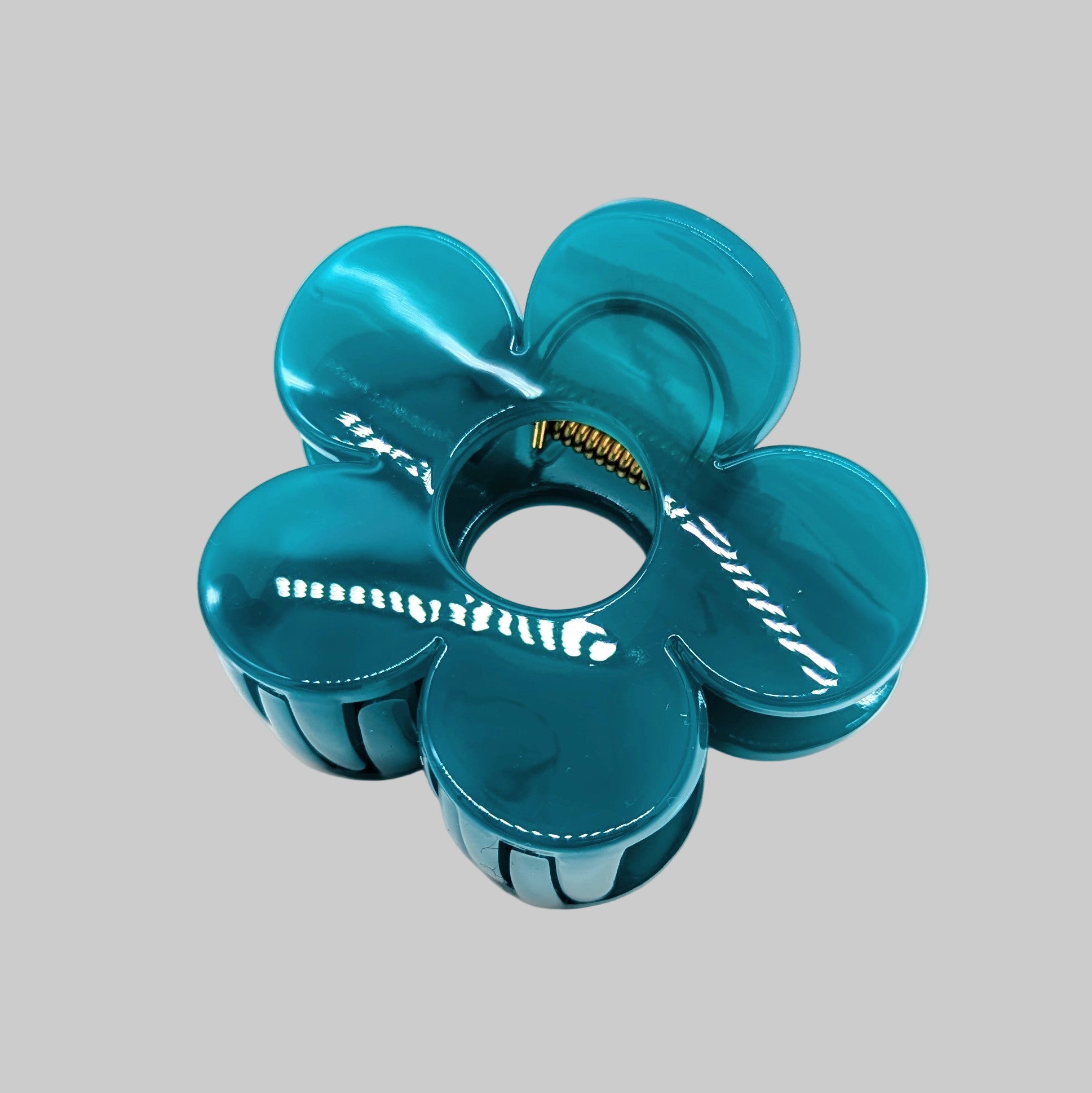 Blue hair clip on a white background